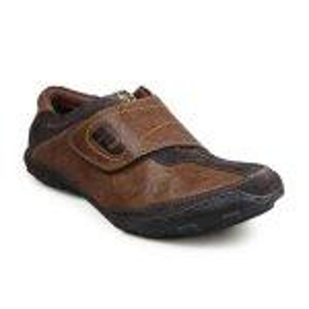 Selling a used Casual Shoe in fair condition. Has worn-down tread.