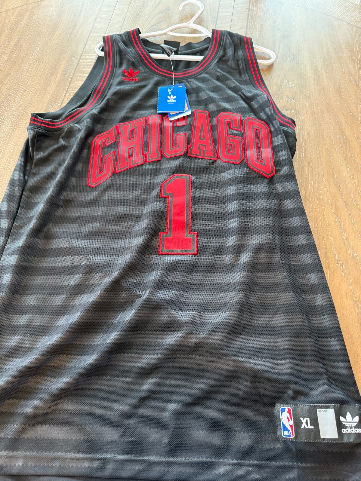 4 Bulls Basketball Jerseys Sz XL-3 used and 1 NWT