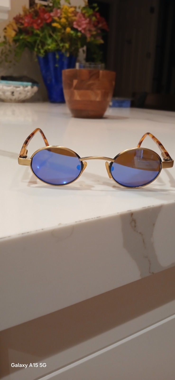 Revo Oval Sunglasses Gold Metal Frame Blue Tinted Plastic Lenses 1106/010