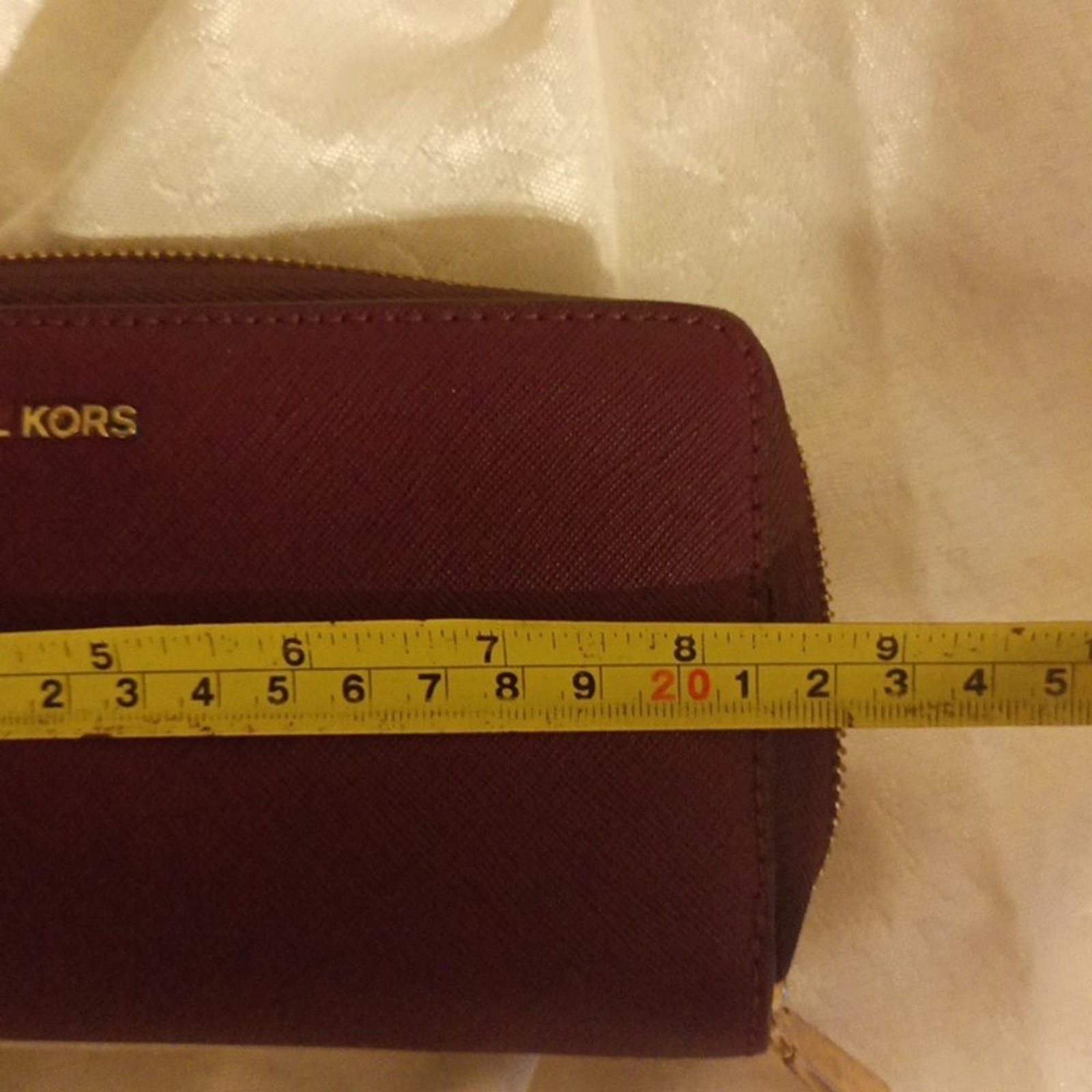 Michael Kors large Saffiano burgundy color leather accordion wallet/ wri…