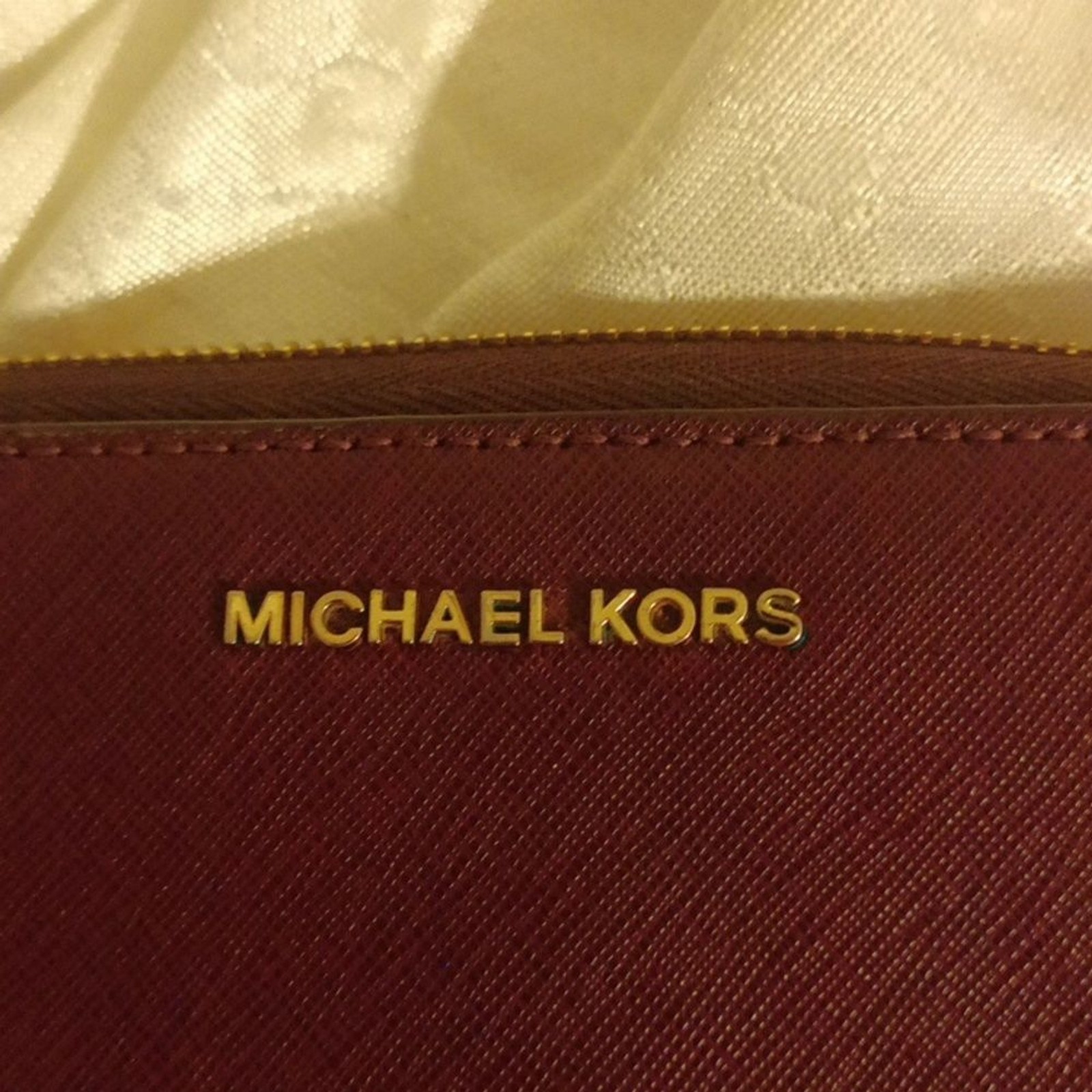 Michael Kors large Saffiano burgundy color leather accordion wallet/ wri…