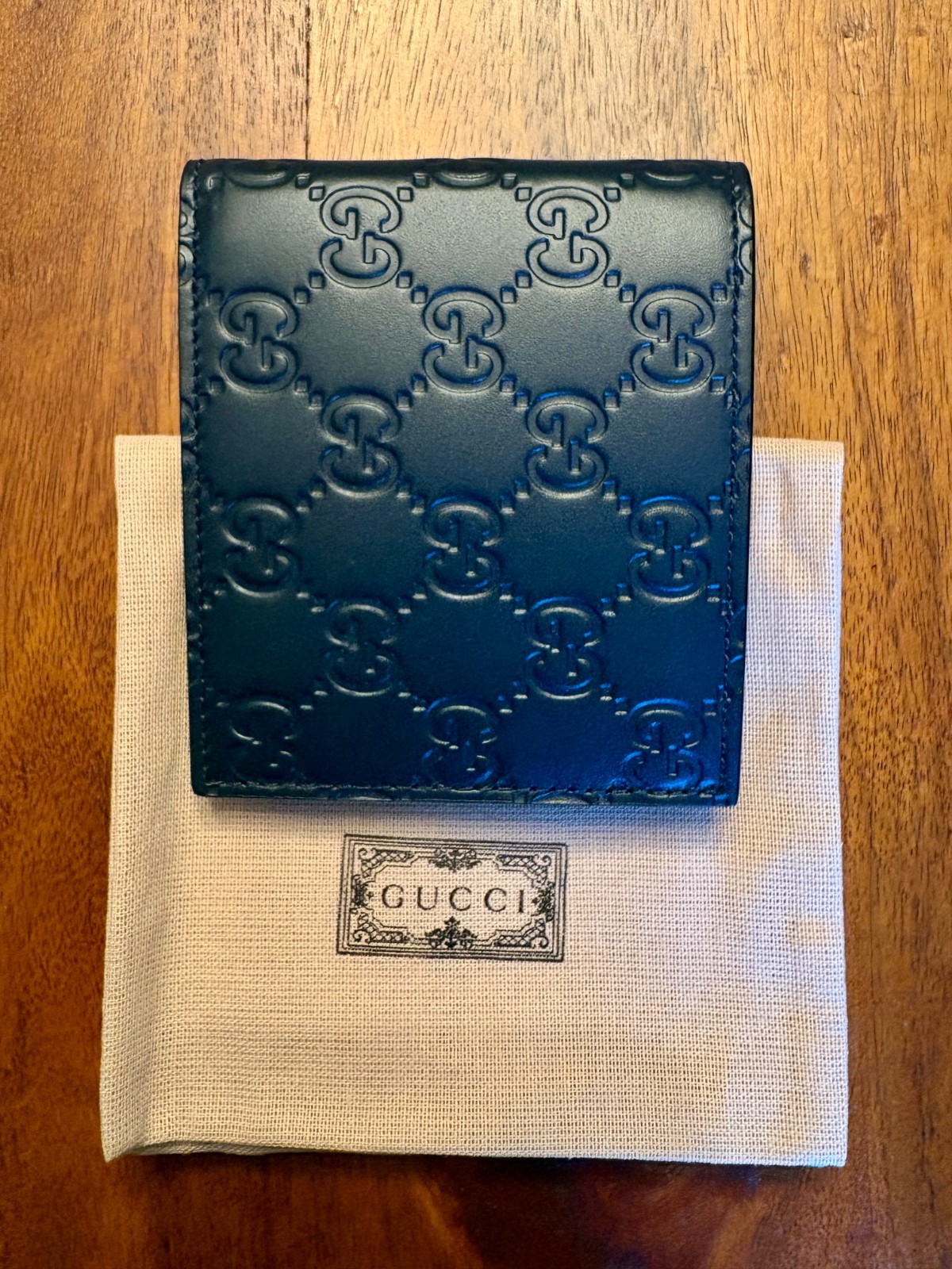 Gucci GG Emblem Bi-fold Wallet In Genuine Black Leather