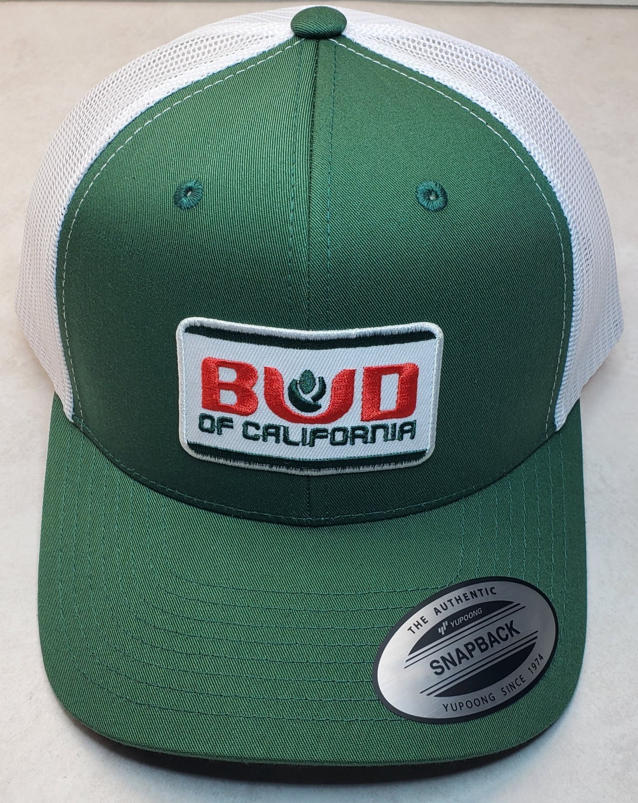 Bud of Calif Patch on Yupoong 6606 Classics Trucker Hat Snapback Evergreen/White