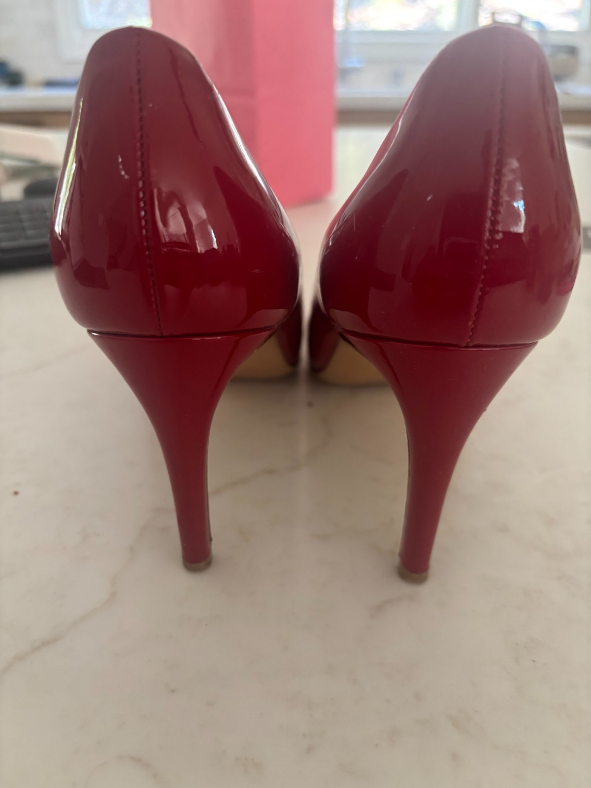 Classic Ferragamo pump in glossy red patent leather