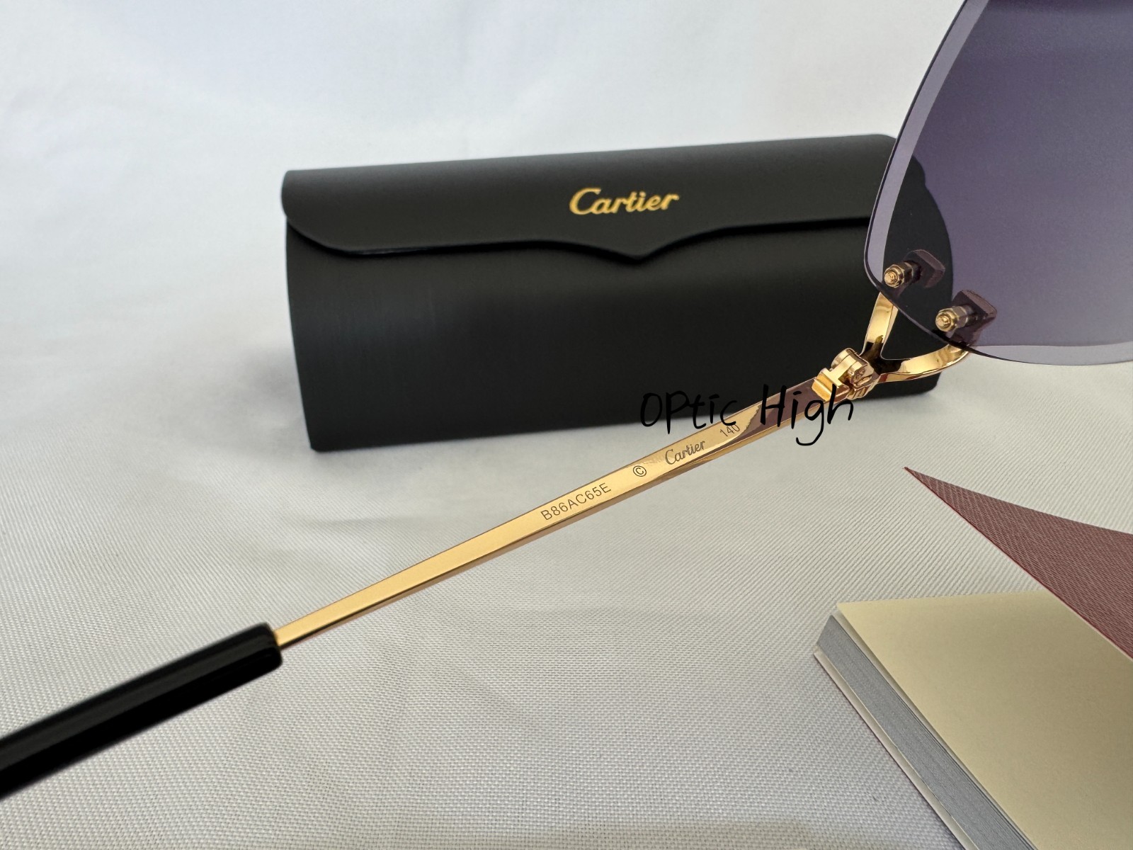 Cartier CT0487S Big C Frameless BLACK Lens Gold Frame